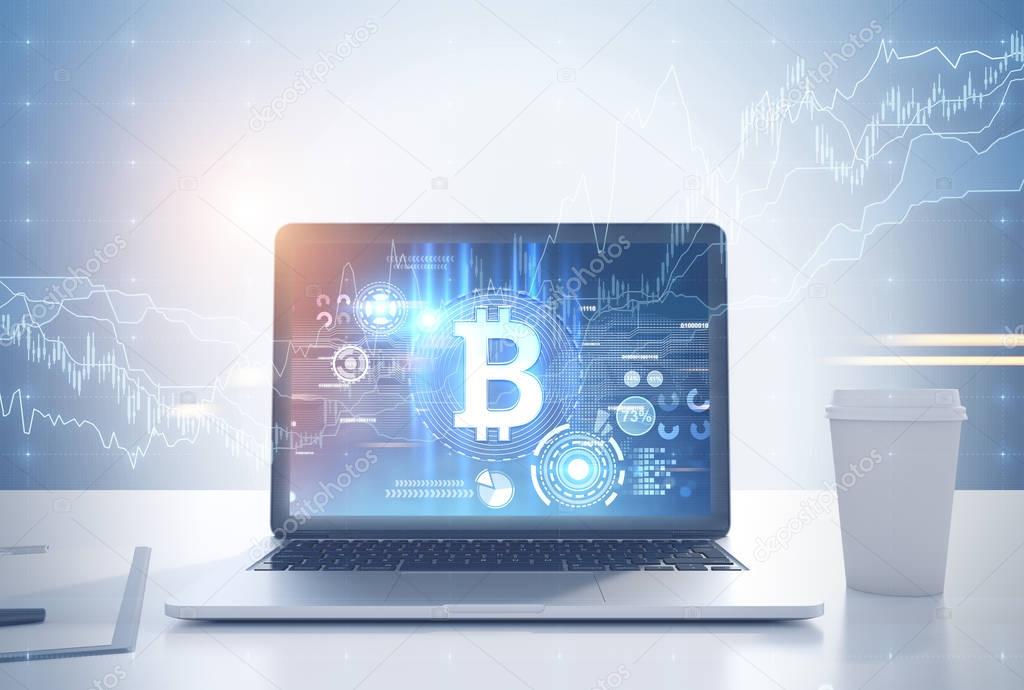 depositphotos 179174868 stock photo laptop bitcoin symbol and graph